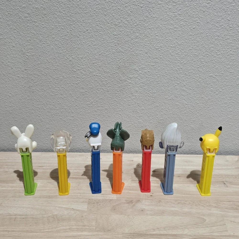 Vintage Pez Dispensers Lot of 7 Jurrasic Park, Daffy, Trolls, Emoji, Easter